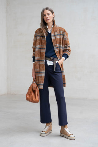 Women’s coat: choosing length, volume and style